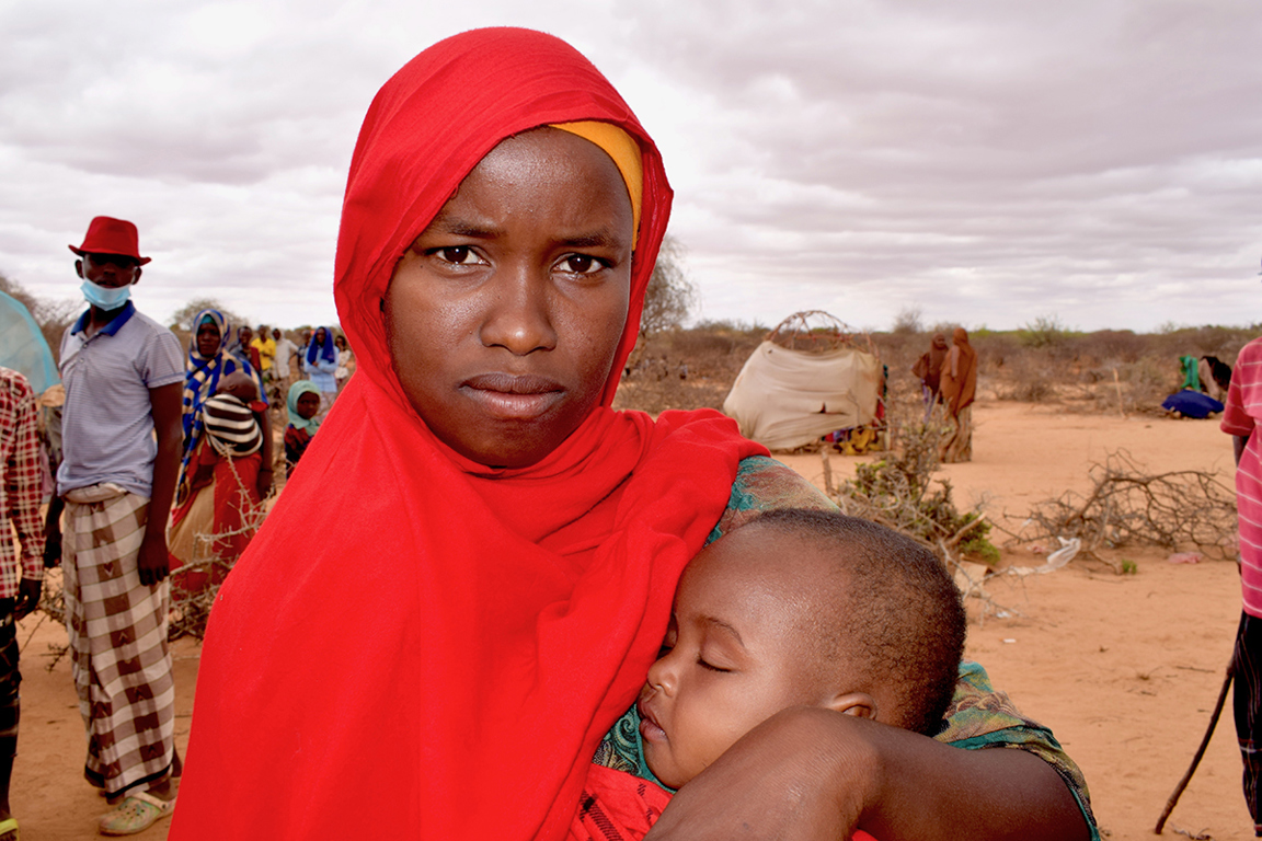 Woman In Somalia With Baby