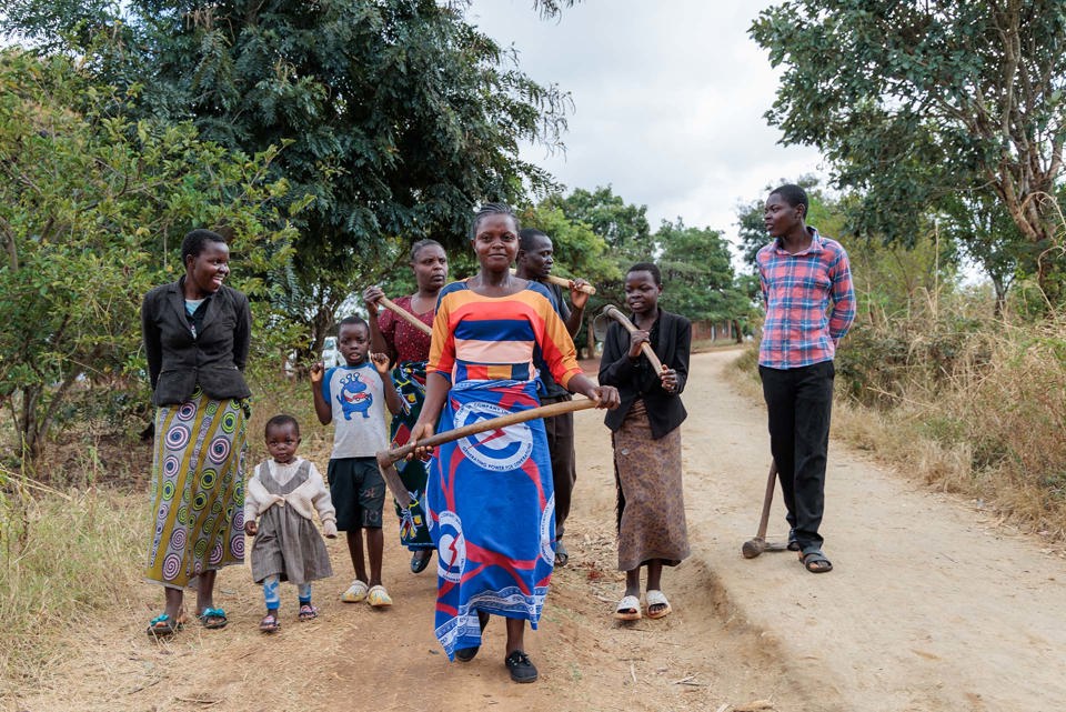 Memory Walking With Her Family On Their Farm