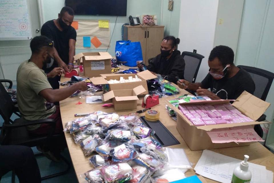 Group of people with hygiene kits in PNG