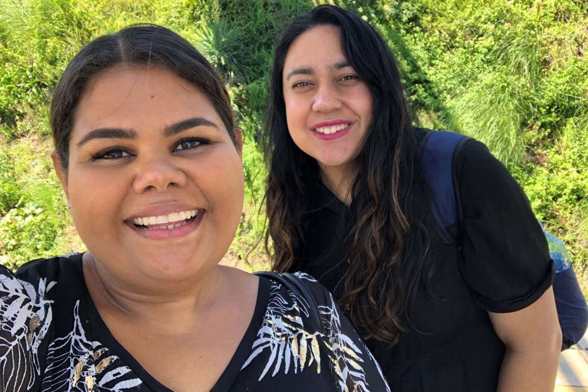 Two smiling women