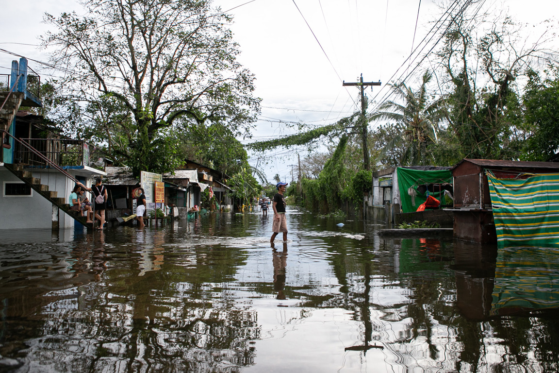 Locals Wade Through Floodwaters After Typhoon Vamco Batters The Philippines. Photo Nassacaritas Philippines