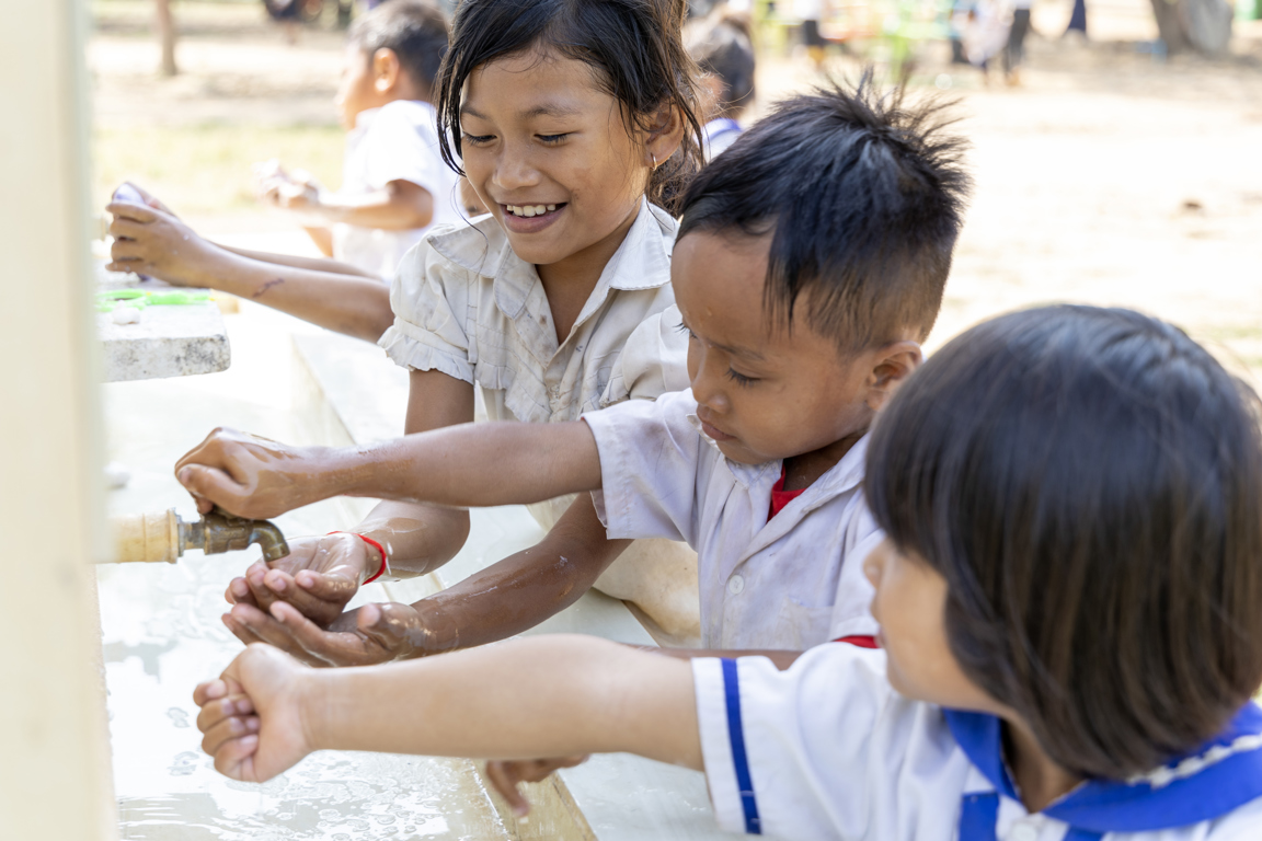 Student Accessing Clean Water At Their School In Cambodia. Photo Caritas Australia