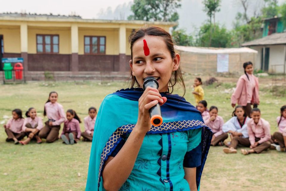 Laxmi Speaking at a child's club