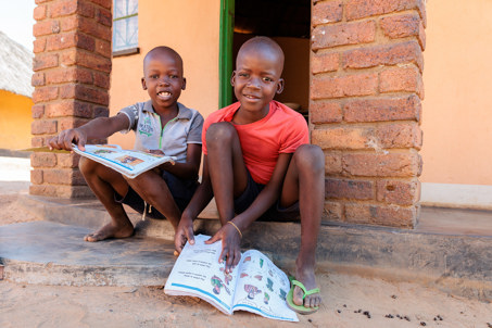 Priscilla Grandchildren Studying Outside Their Home