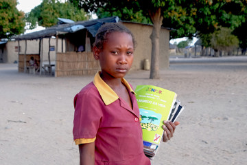 Anatercia walks to her local school in her village in Mozambique