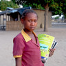 Anatercia walks to her local school in her village in Mozambique