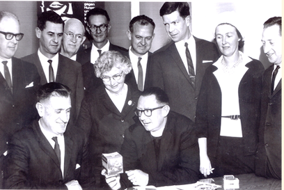 Roy Boylan and Sydney Committee with first Project Compassion box in 1965