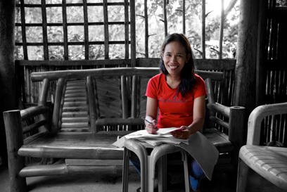 Aloma With Her Paperwork After Completing Her Training Courses. Credit Caritas Australia