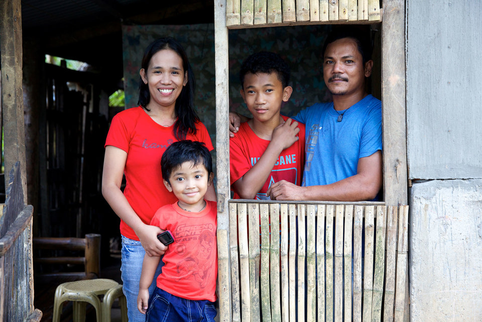 Aloma With Her Family In Their Home In The Philippines (1)