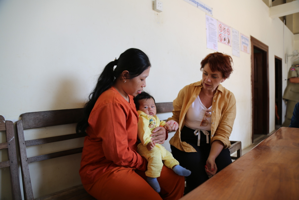 Caritas Australia CEO Kirsty Robertson Speaking To A Woman In The Krati Prison Program