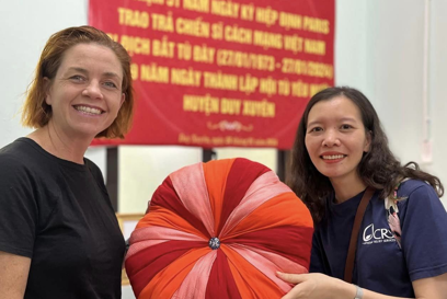 Kirsty Robertson And Ms Pham Thi Kieu Le From CRS With A Pillow Made By Program Participants At The Organisation Of Persons With Disabilities Photo Credit CRS