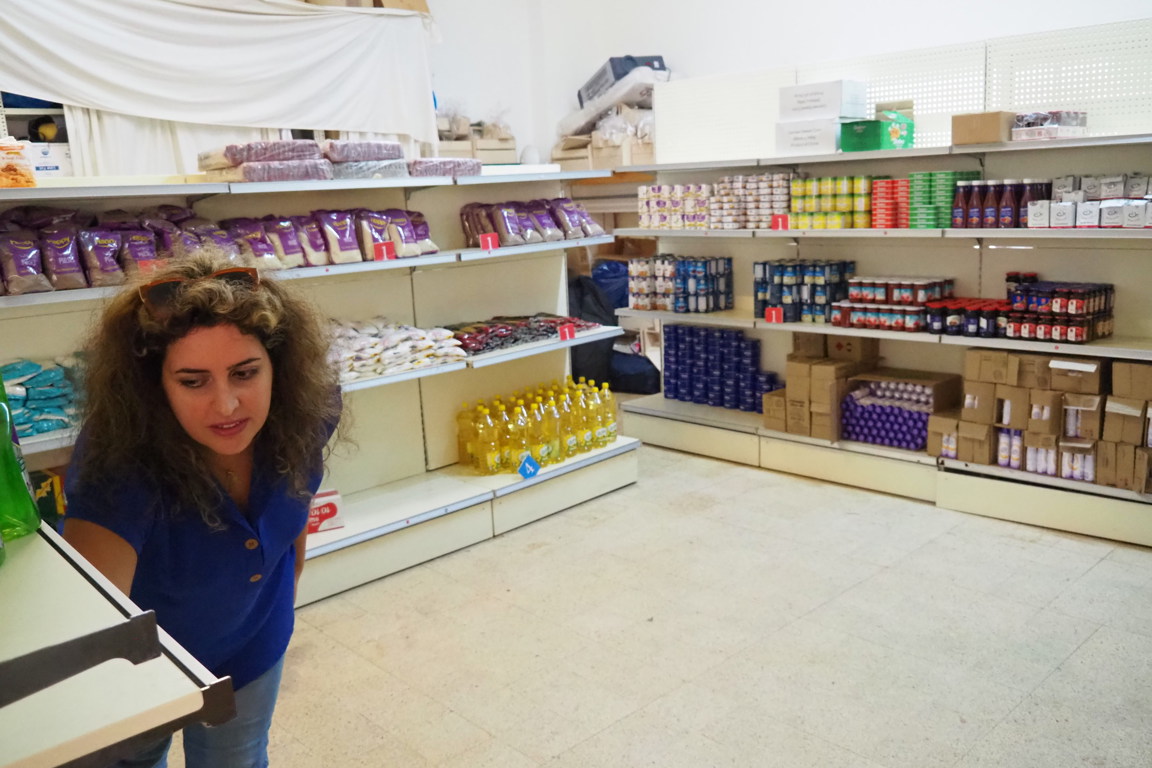 Christine Abboud Senior Social Worker At Caritas Lebanon Working At A Household Essentials Distribution Marketplace In Beirut Photo Credit Caritas Australia