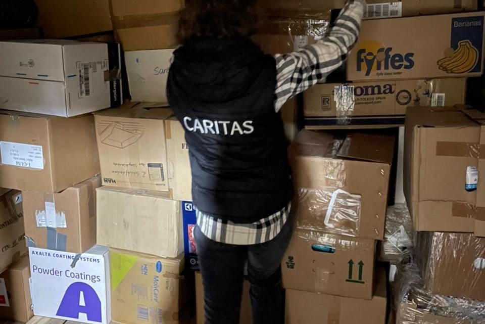 Caritas Volunteer Unpacking Goods In Chernivtsi. Photo Caritas Ukraine