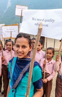 Laxmi With Placard