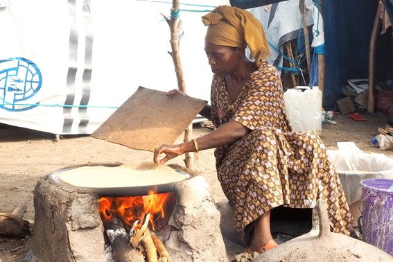 Woman Preparing Food In IDP Camp In Northern Ethiopia. Photo Caritas Australia