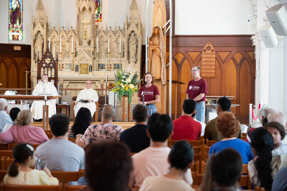 Kirsty and Richard speaking at a Cathedral